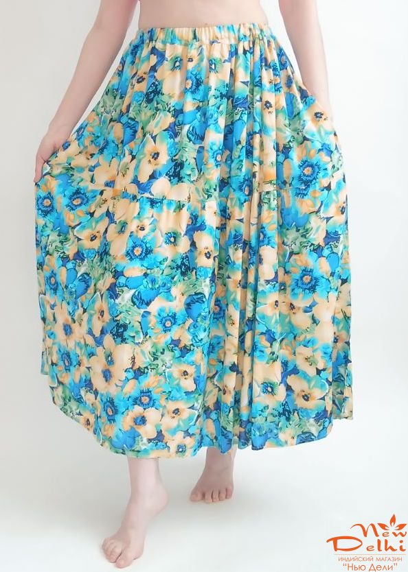 Спідниця штапель, довга.Жовто-блакитна з квітами .